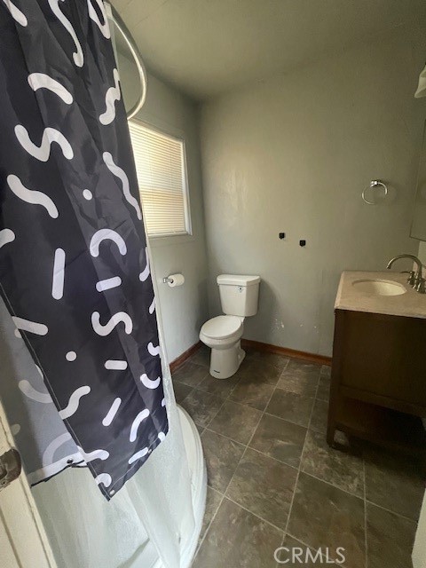 172 North 13th Street Grover Beach, CA 93433 - Photo 10 of 21 a bathroom with a sink and a toilet