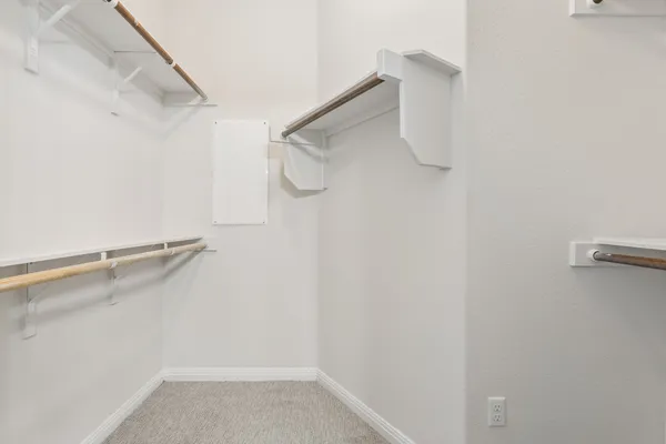 a view of a room with racks on the wall