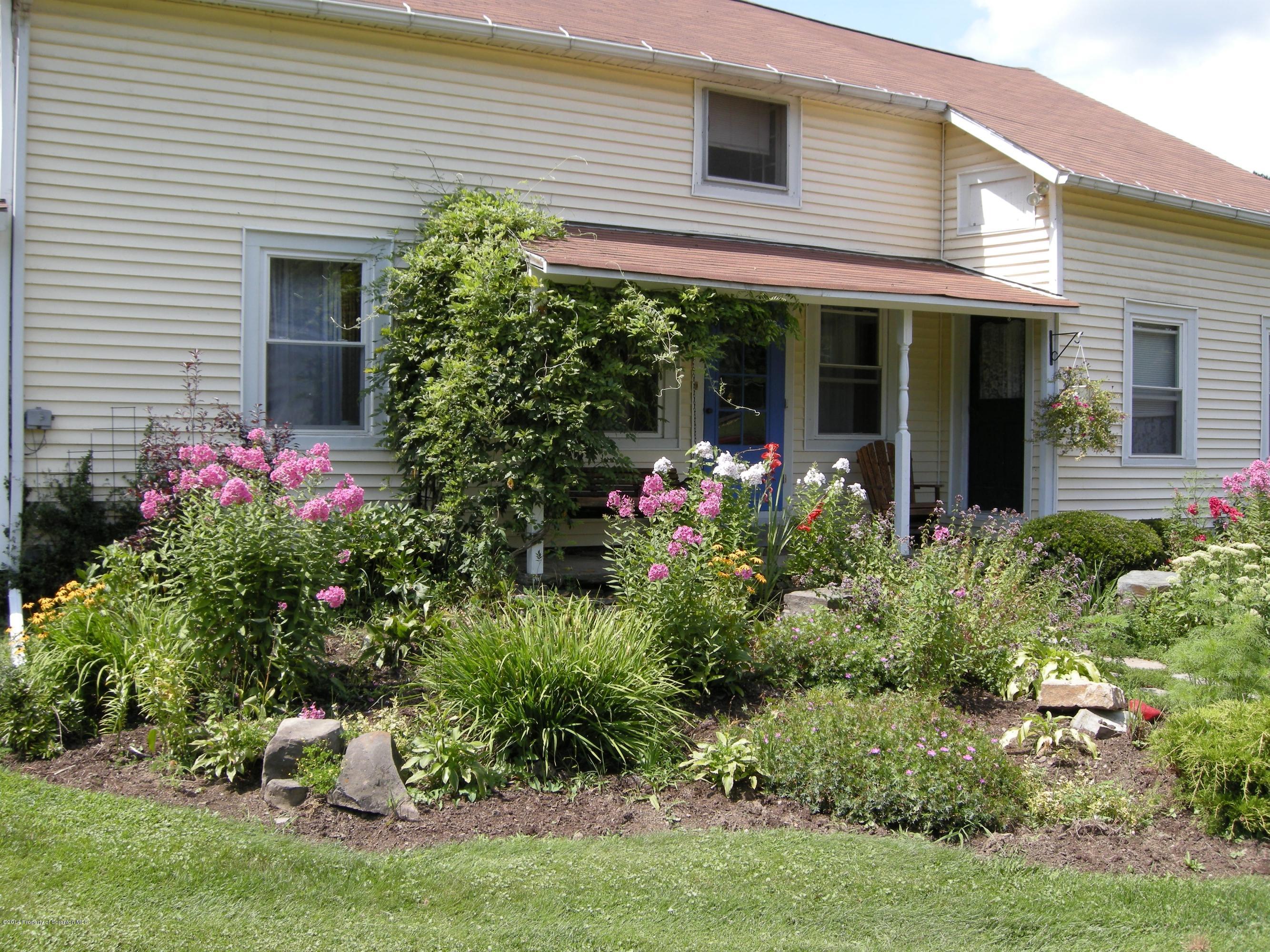611 Highway 467 Rome, PA 18837 - Photo 11 of 45 front view of a house with a yard
