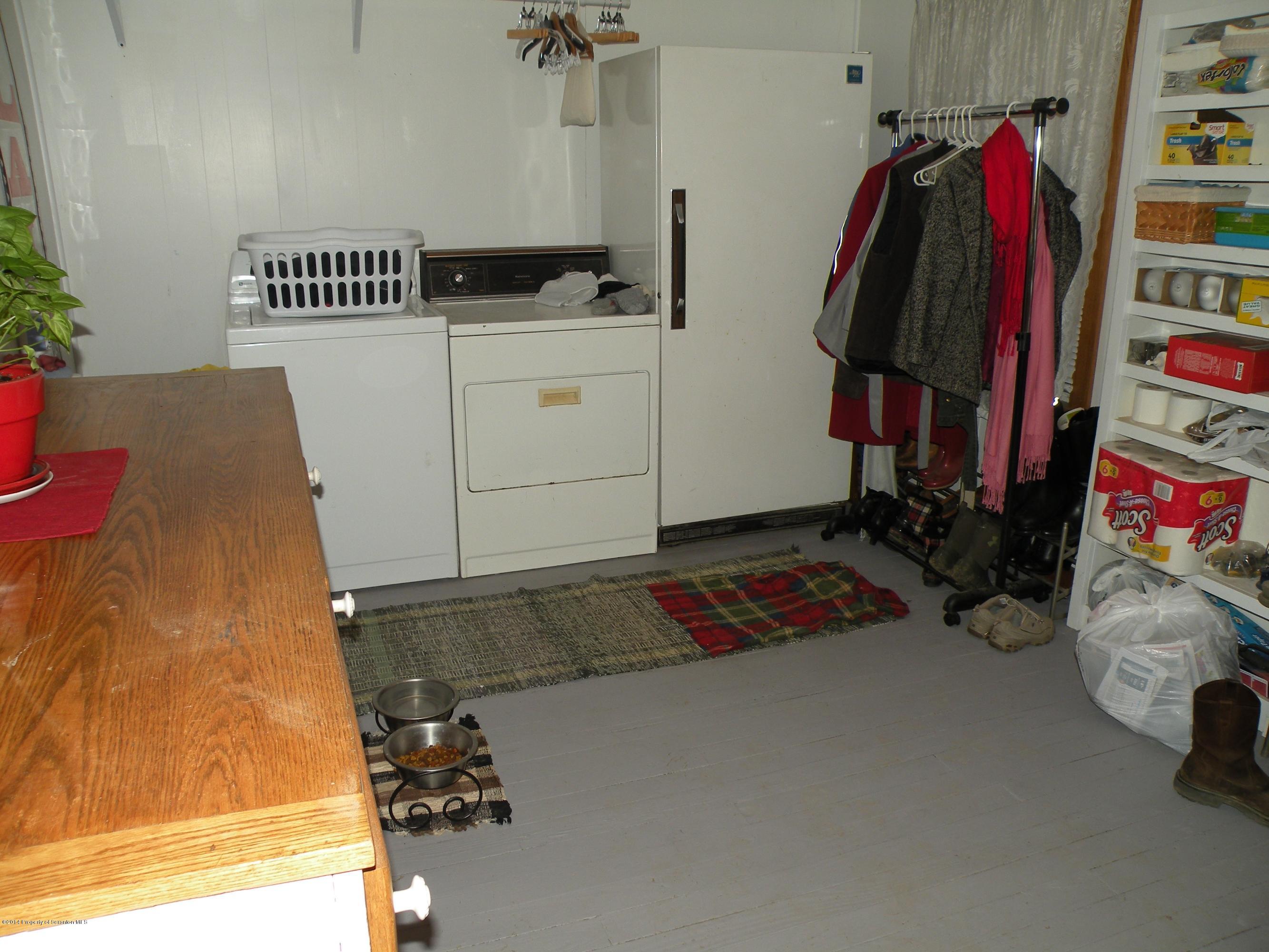 611 Highway 467 Rome, PA 18837 - Photo 28 of 45 a view of walk in closet with clothes and shoes