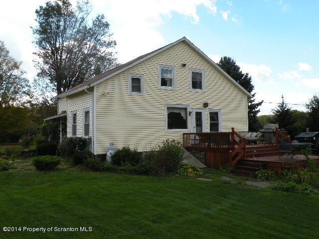 611 Highway 467 Rome, PA 18837 - Photo 4 of 45 a view of a house with backyard