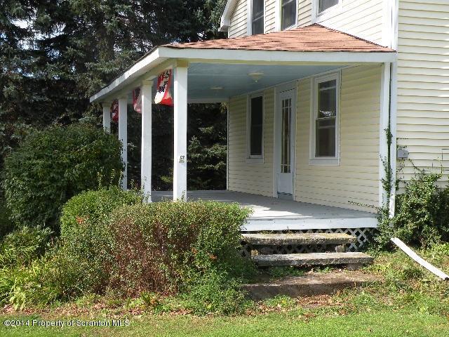 611 Highway 467 Rome, PA 18837 - Photo 5 of 45 front view of house with a yard