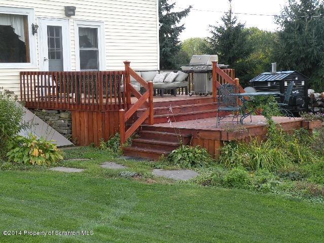 611 Highway 467 Rome, PA 18837 - Photo 6 of 45 a view of a house with backyard and wooden fence