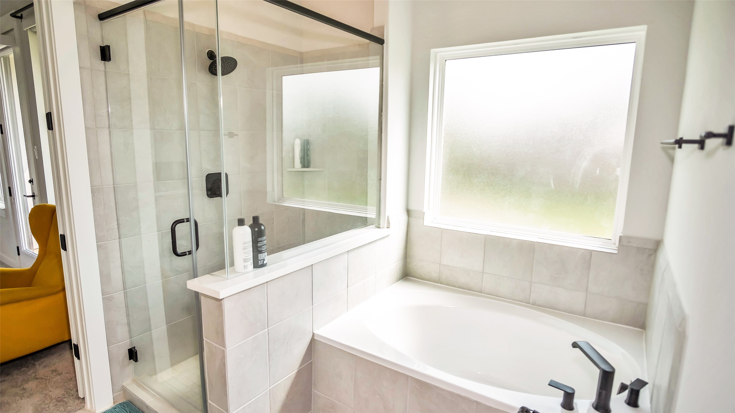 1919 Pueblo Nuevo Path Houston, TX 77077 - Photo 6 of 50 a bathroom with a bathtub and a shower