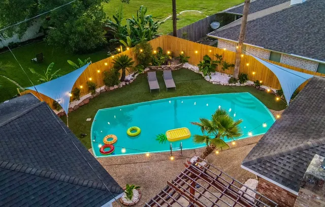 a view of an outdoor space with a swimming pool