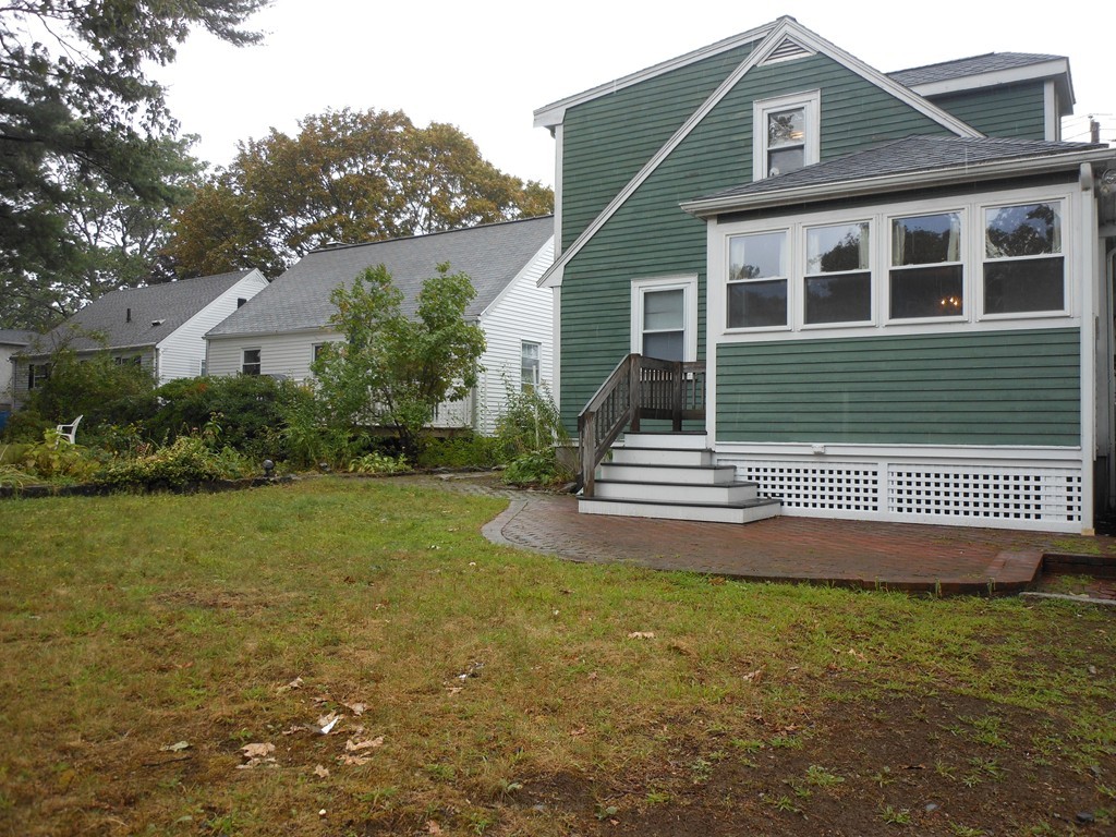 3 Outlook Road Waltham, MA 02451 - Photo 2 of 15 a front view of a house with garden
