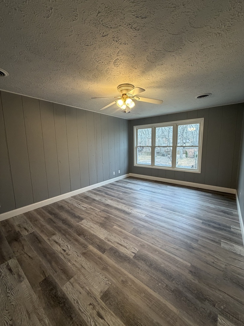 2 Hickory Lane Metropolis, IL 62960 - Photo 17 of 20 wooden floor in an empty room with a window