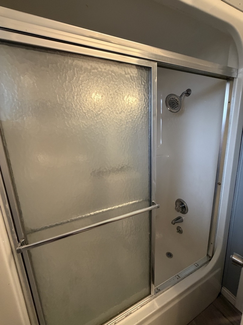 2 Hickory Lane Metropolis, IL 62960 - Photo 20 of 20 a bathroom with a glass shower door