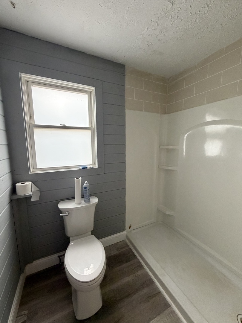 2 Hickory Lane Metropolis, IL 62960 - Photo 10 of 20 a bathroom with a toilet sink and mirror