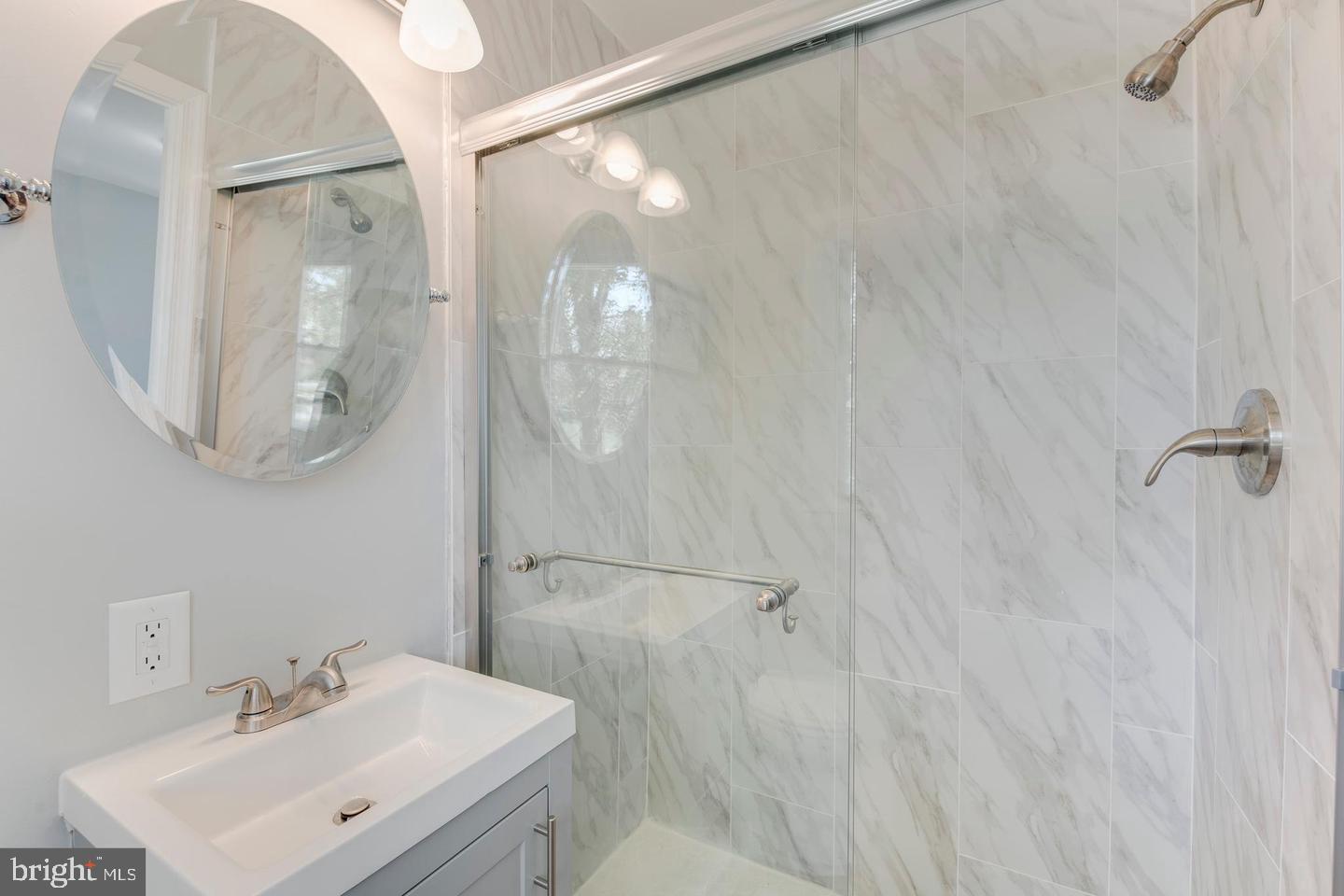 918 Shelley Road Towson, MD 21286 - Photo 11 of 41 Master Bath - brand new glass shower doors & sink