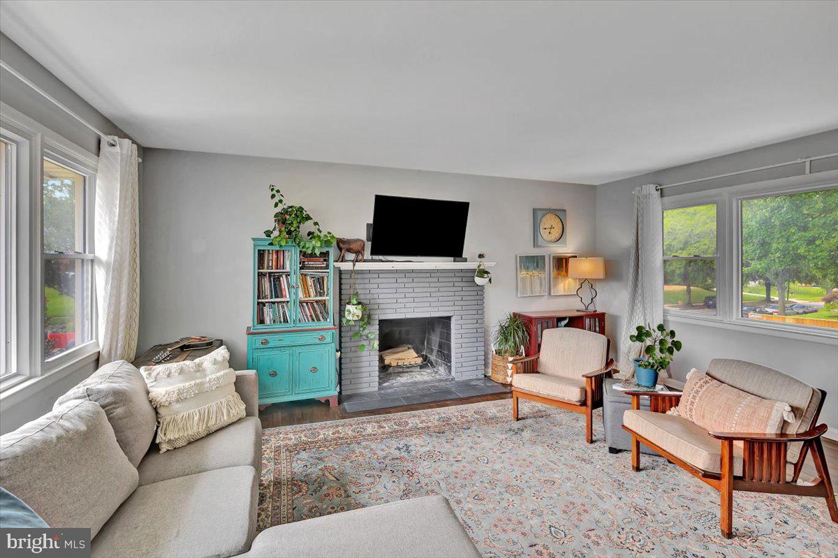 918 Shelley Road Towson, MD 21286 - Photo 6 of 41 Main Level living room with woodburning fireplace