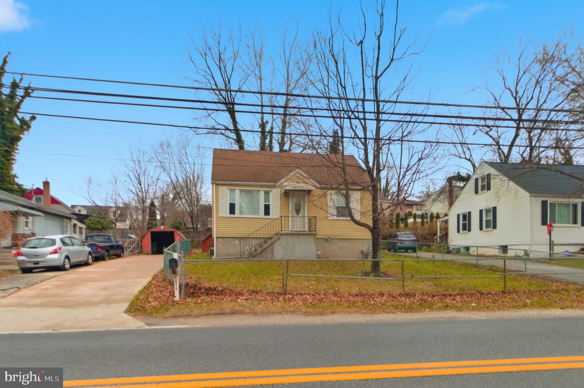 5330 Dogwood Road Woodlawn, MD 21207 - Photo 2 of 38 a view of a street with cars parked