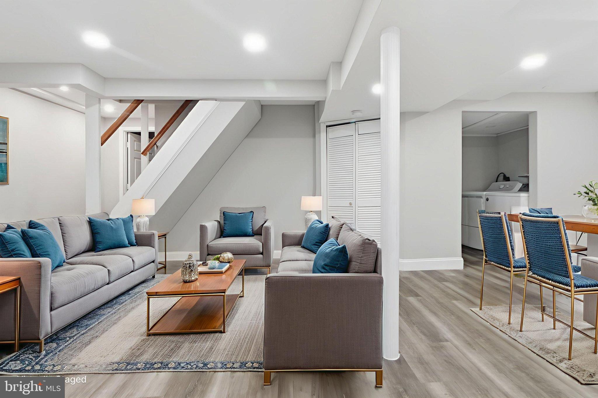 5330 Dogwood Road Woodlawn, MD 21207 - Photo 24 of 38 a living room with furniture and a table