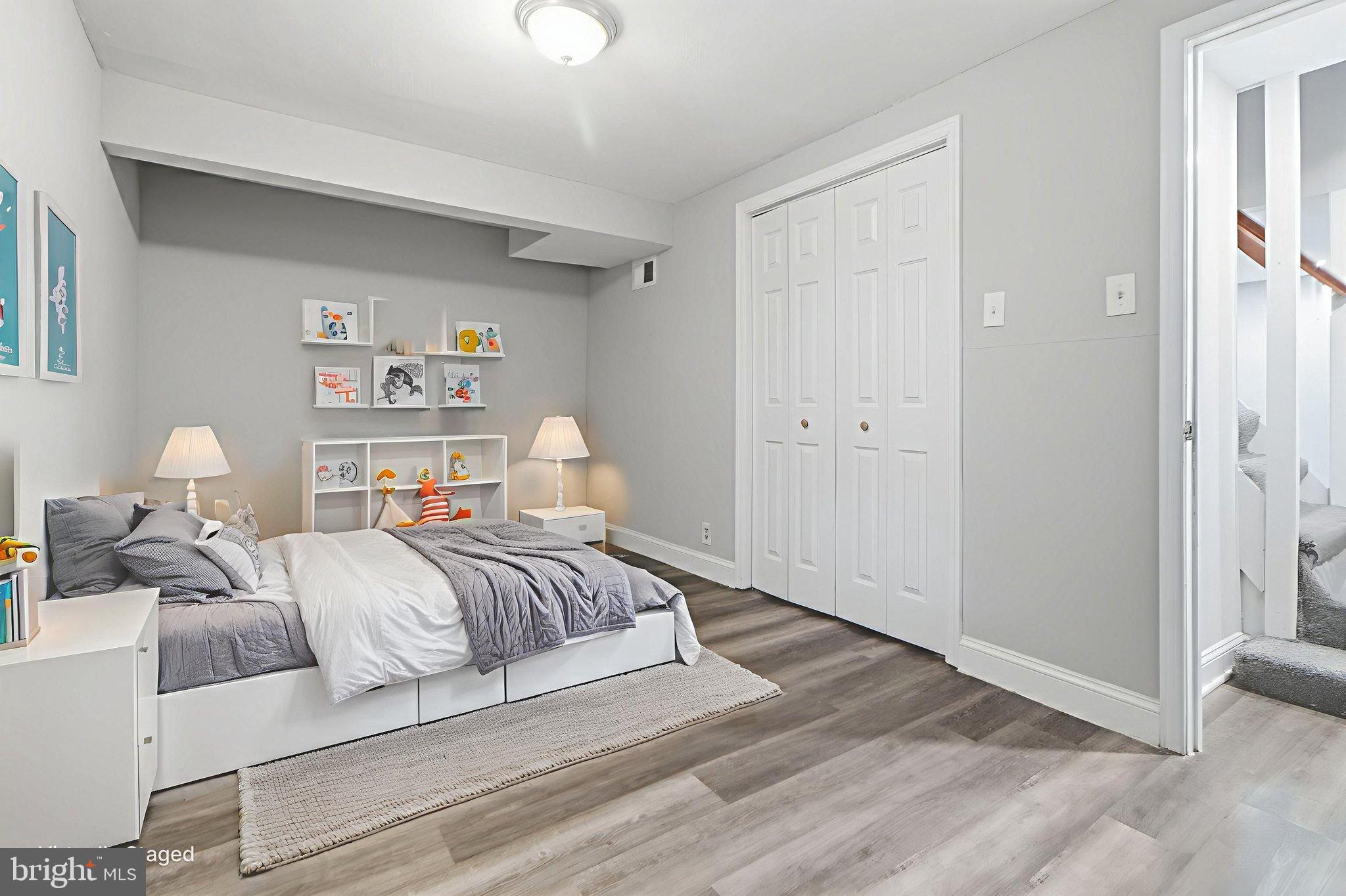 5330 Dogwood Road Woodlawn, MD 21207 - Photo 27 of 38 a bedroom with a bed and closet