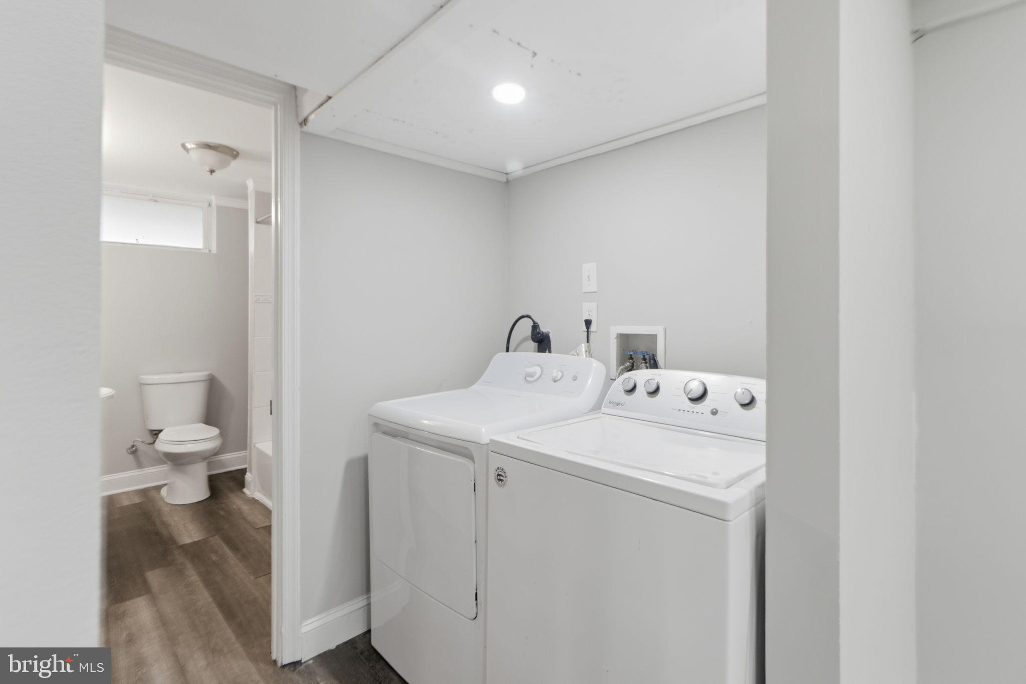 5330 Dogwood Road Woodlawn, MD 21207 - Photo 30 of 38 a utility room with dryer and washer