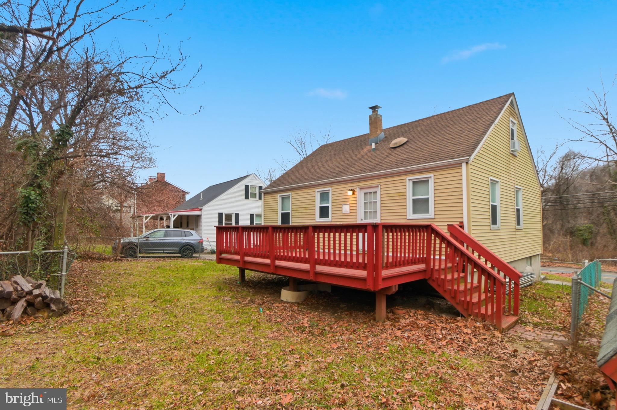 5330 Dogwood Road Woodlawn, MD 21207 - Photo 31 of 38 a view of a house with a yard