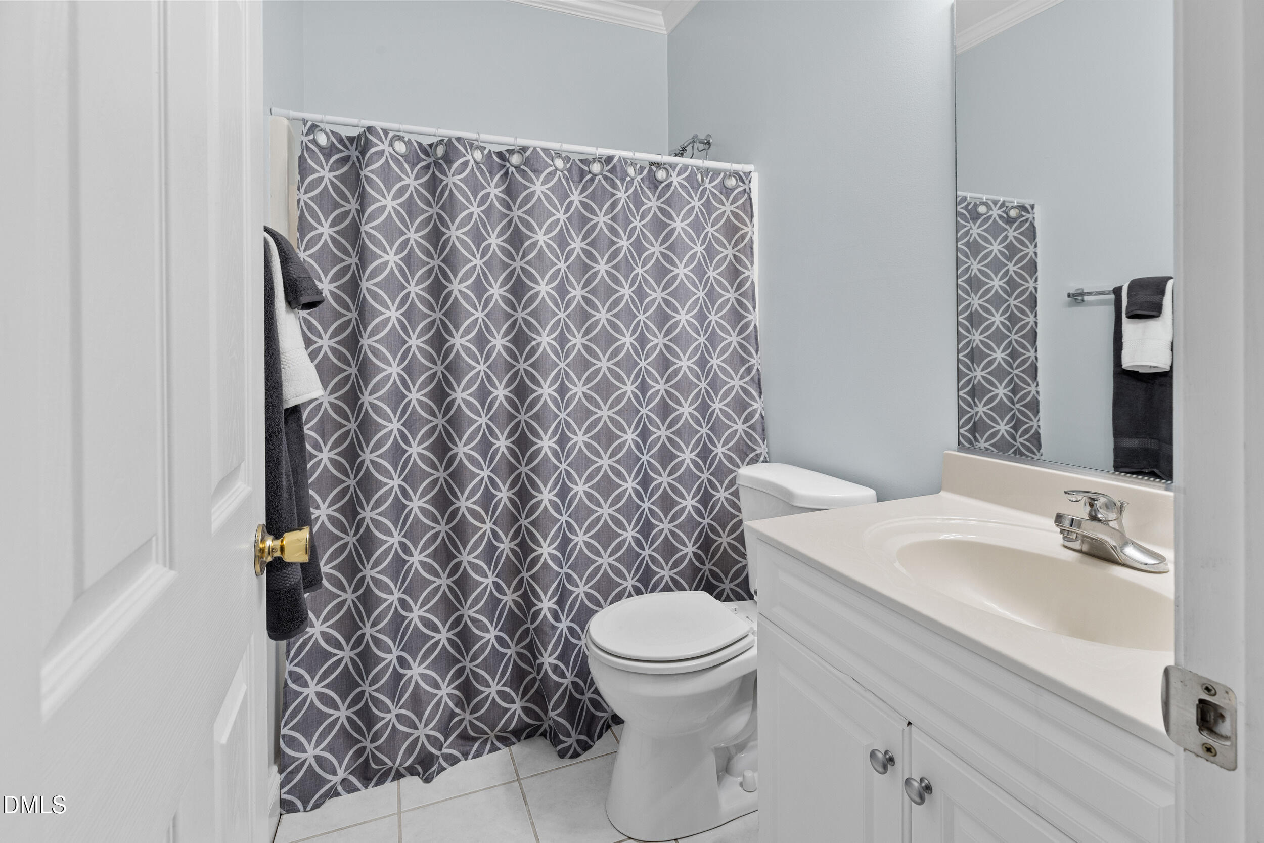 7619 Whitaker Drive Summerfield, NC 27358 - Photo 13 of 25 a bathroom with a sink toilet and shower