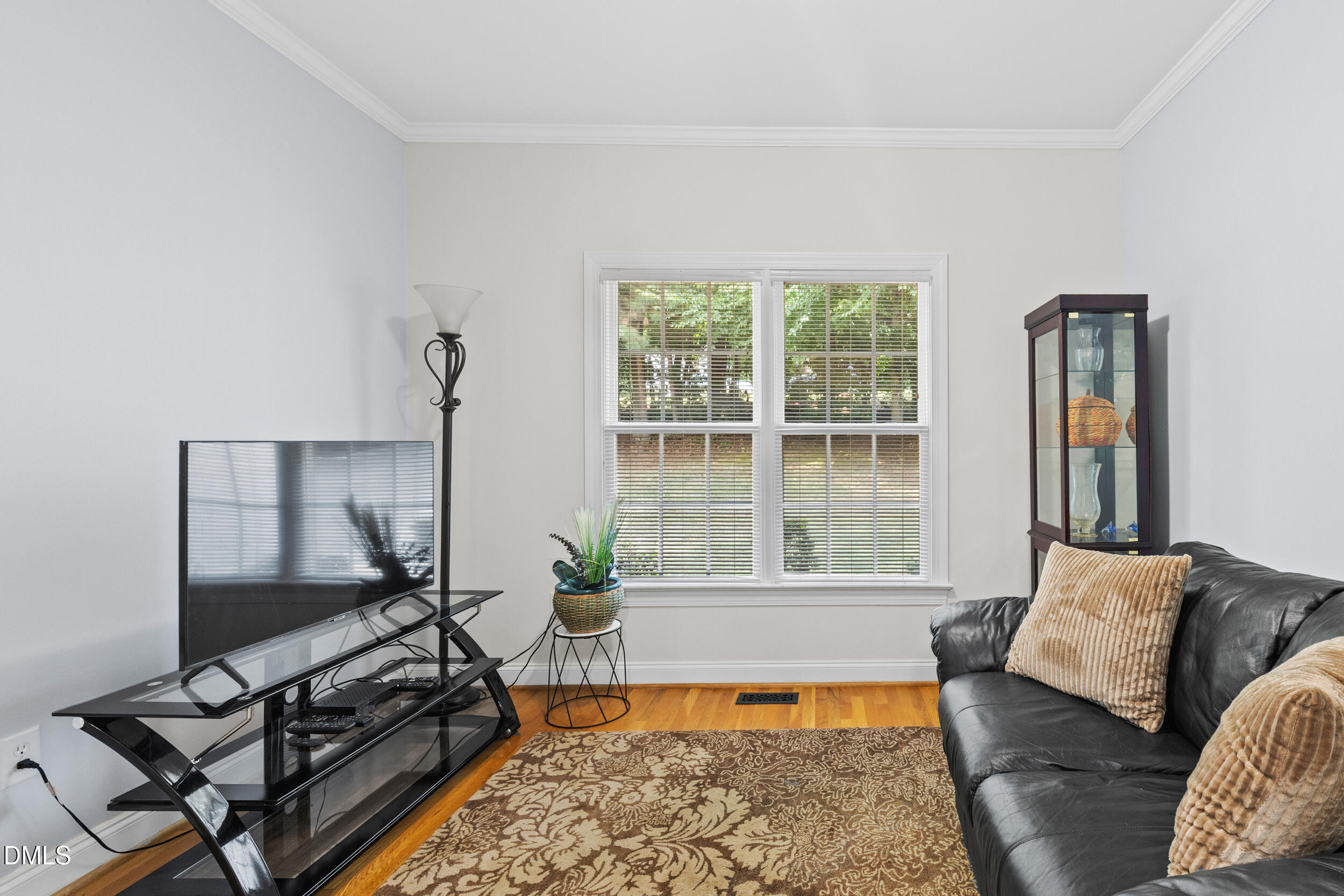 7619 Whitaker Drive Summerfield, NC 27358 - Photo 15 of 25 a living room with furniture and a window
