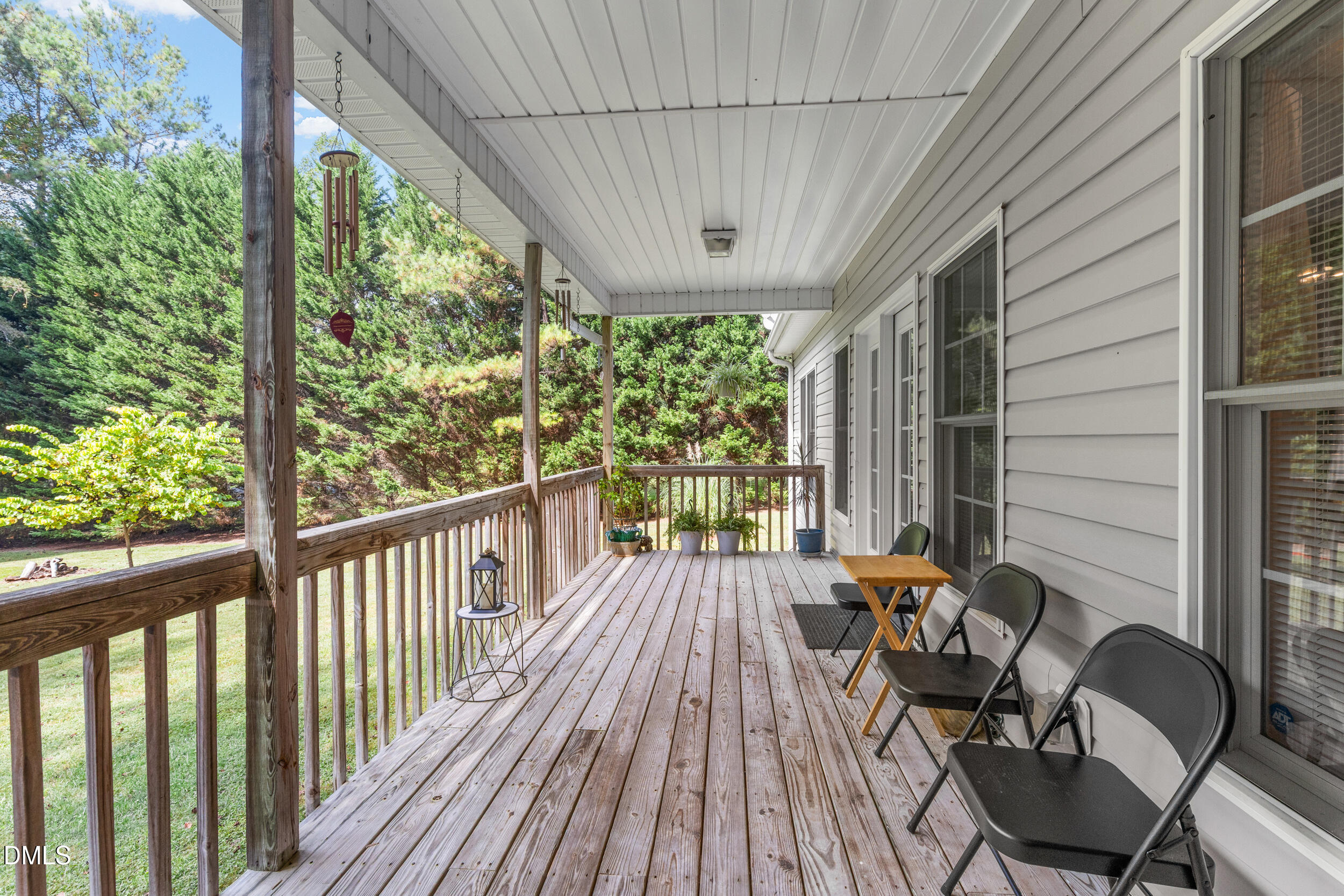 7619 Whitaker Drive Summerfield, NC 27358 - Photo 24 of 25 a view of balcony with wooden floor and outdoor seating