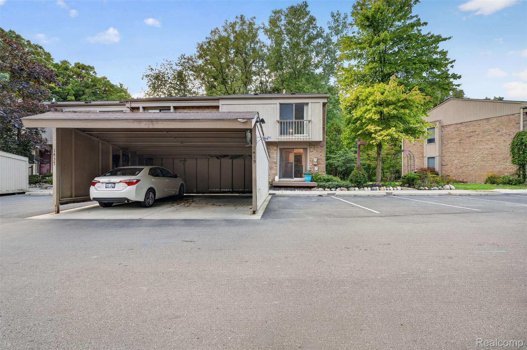 1439 Oakbrook E Drive Rochester, MI 48307 - Photo 54 of 68 Attached carport with dedicated parking space