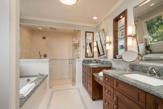 840 Longview Road Hillsborough, CA 94010 - Photo 17 of 49 a bathroom with a granite countertop sink mirror and a bathtub