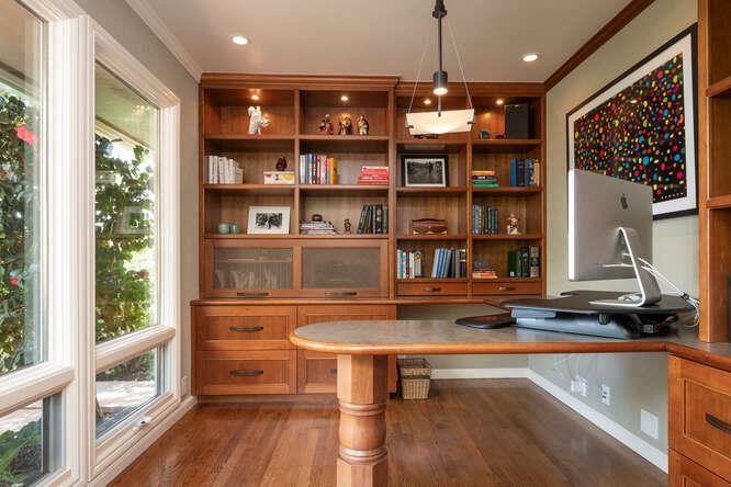 840 Longview Road Hillsborough, CA 94010 - Photo 19 of 49 a view of a room with shelves and wooden floor