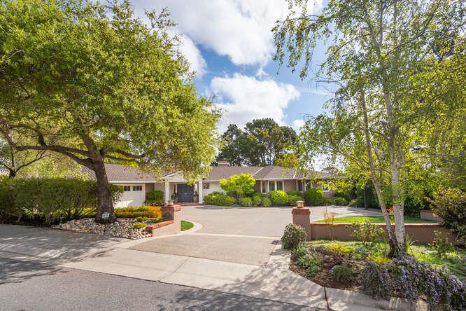 840 Longview Road Hillsborough, CA 94010 - Photo 2 of 49 a view of a street with houses