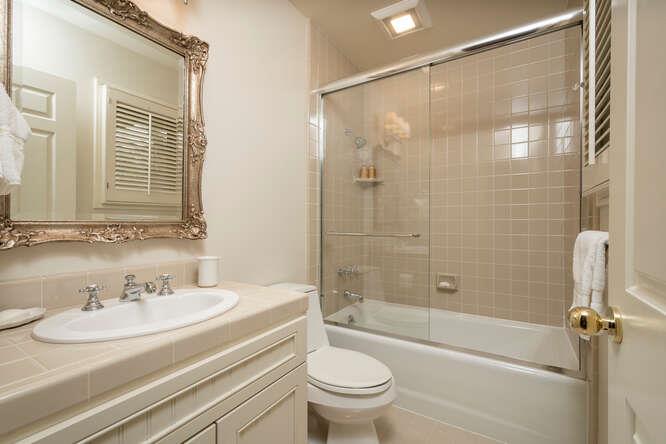 840 Longview Road Hillsborough, CA 94010 - Photo 22 of 49 a bathroom with a sink toilet and shower
