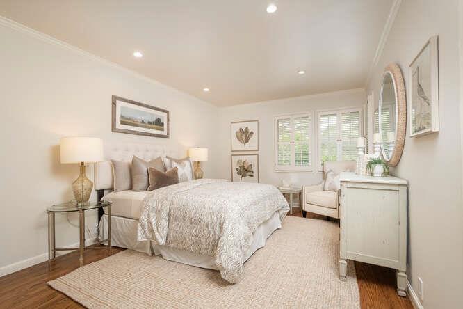 840 Longview Road Hillsborough, CA 94010 - Photo 23 of 49 a spacious bedroom with a bed and a large window