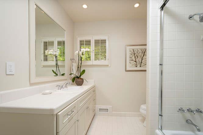 840 Longview Road Hillsborough, CA 94010 - Photo 24 of 49 a bathroom with a sink a toilet and shower