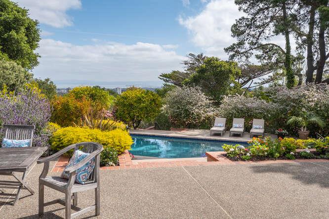 840 Longview Road Hillsborough, CA 94010 - Photo 28 of 49 a view of backyard with outdoor seating and green space