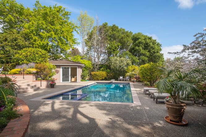 840 Longview Road Hillsborough, CA 94010 - Photo 29 of 49 a front view of a house with a garden