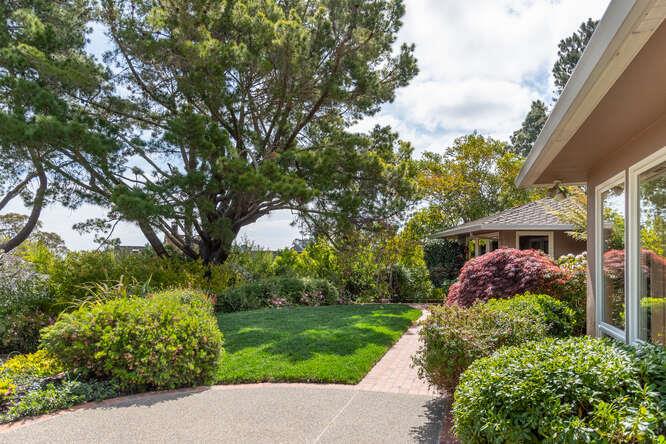 840 Longview Road Hillsborough, CA 94010 - Photo 35 of 49 a front view of a house with garden