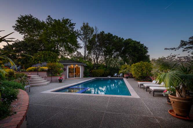 840 Longview Road Hillsborough, CA 94010 - Photo 44 of 49 a view of a swimming pool with a patio