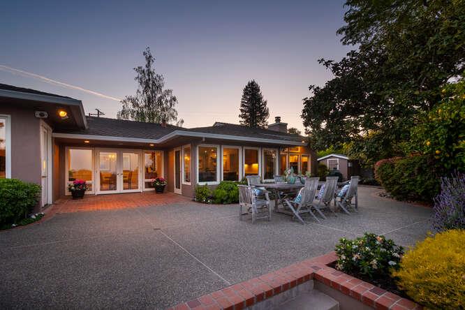 840 Longview Road Hillsborough, CA 94010 - Photo 45 of 49 a view of a house with patio furniture and a porch