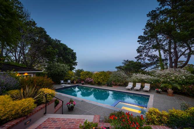 840 Longview Road Hillsborough, CA 94010 - Photo 47 of 49 a view of a swimming pool with a patio