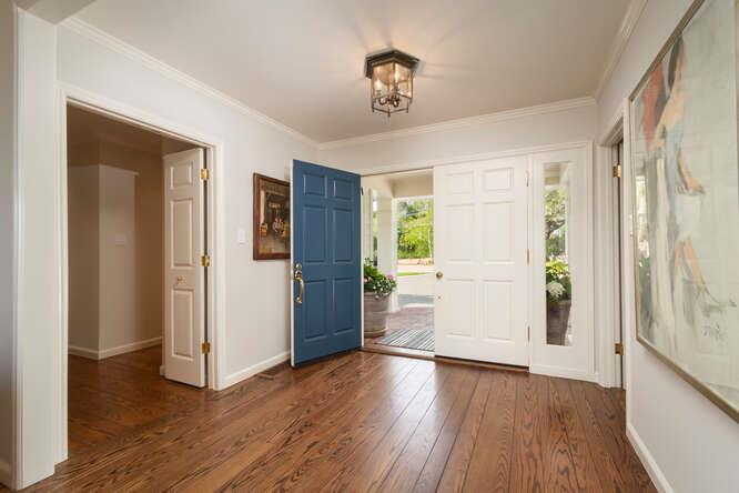 840 Longview Road Hillsborough, CA 94010 - Photo 5 of 49 a view of an empty room with wooden floor and a window