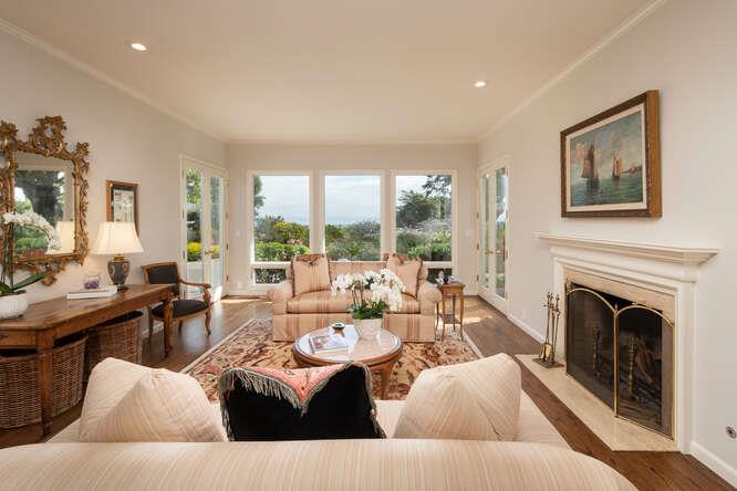 840 Longview Road Hillsborough, CA 94010 - Photo 6 of 49 a living room with furniture large window and a fireplace