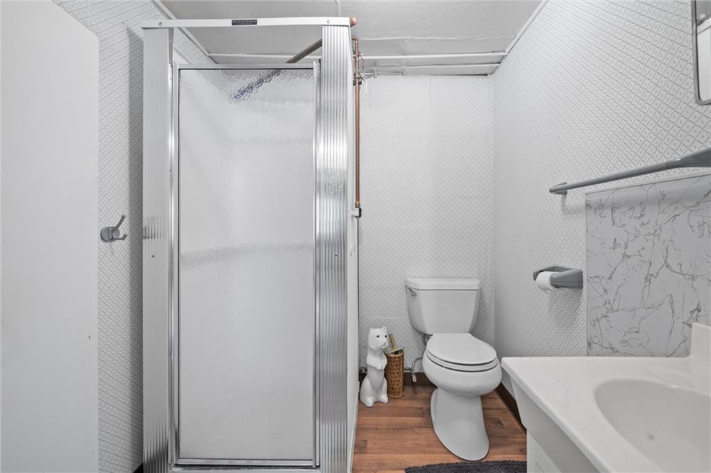 2184 Dime Road Vandergrift, PA 15690 - Photo 13 of 25 a bathroom with a toilet and a shower