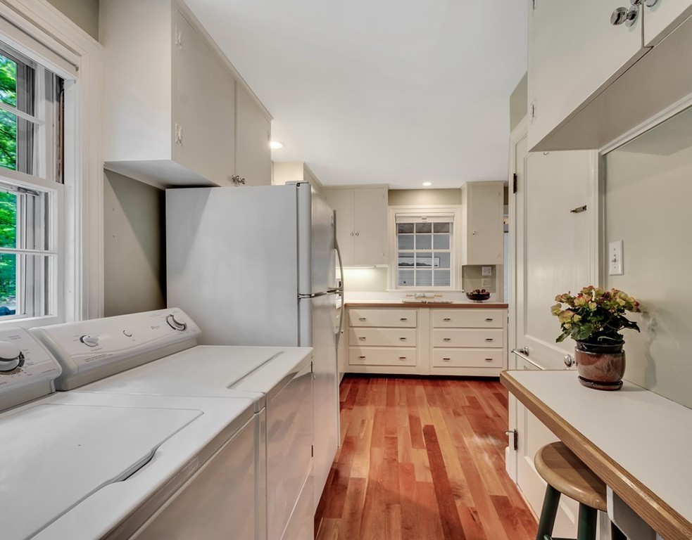 140 Bolton Road Harvard, MA 01451 - Photo 8 of 22 a large bedroom with a bed and wooden floor