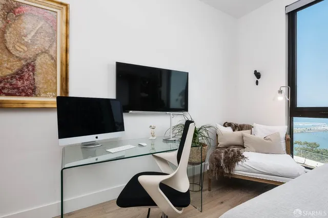 a bathroom with a double vanity sink toilet mirror and shower