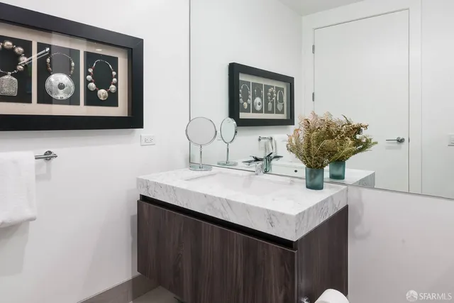 a bathroom with a shower and toilet