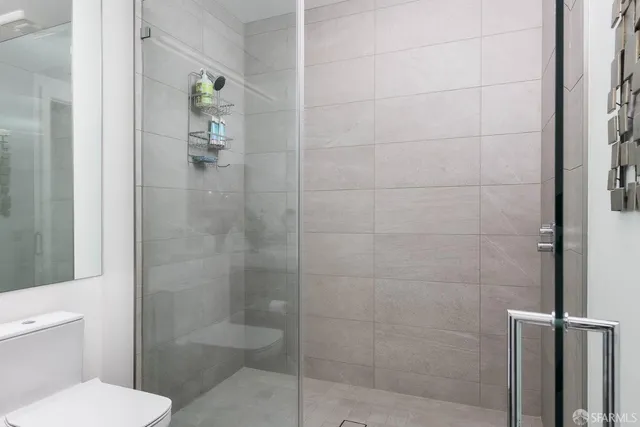 a close view of a utility room with dryer and washer
