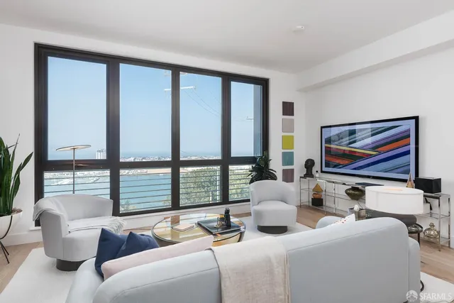 a room with furniture and large window