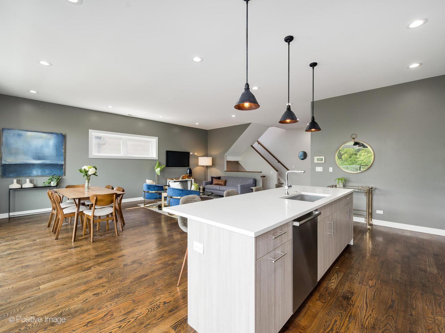 1832 West Rice Street, Unit 3 Chicago, IL 60622 - Photo 12 of 30 a kitchen with a sink a stove and chairs