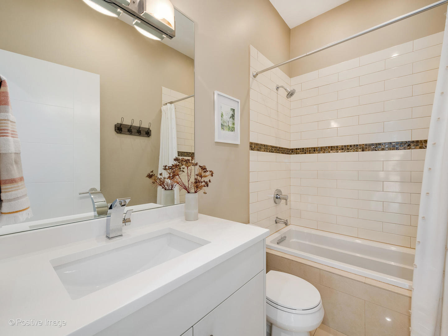 1832 West Rice Street, Unit 3 Chicago, IL 60622 - Photo 24 of 30 a bathroom with a sink a toilet and shower