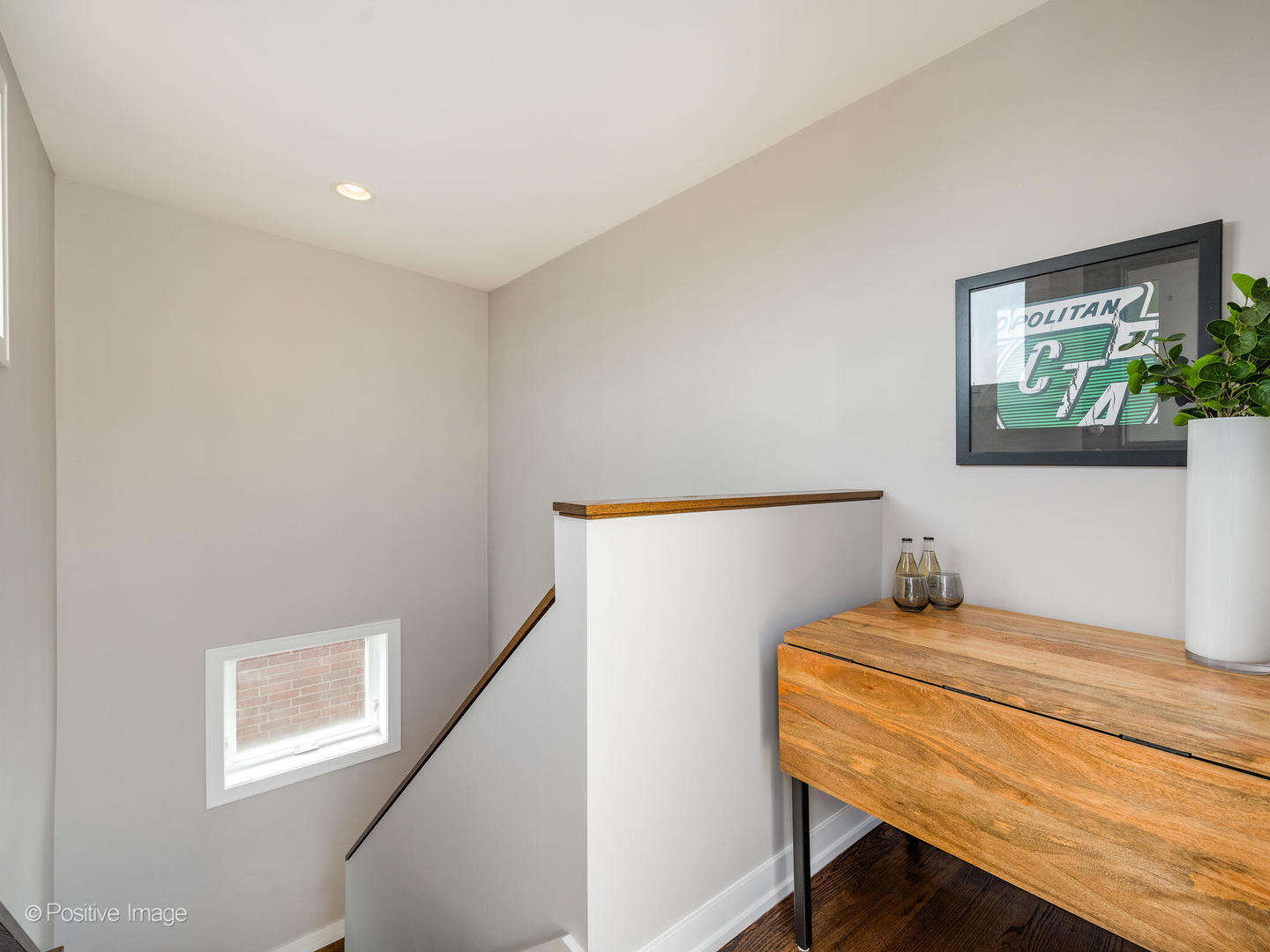 1832 West Rice Street, Unit 3 Chicago, IL 60622 - Photo 25 of 30 a bedroom with a bed and a table