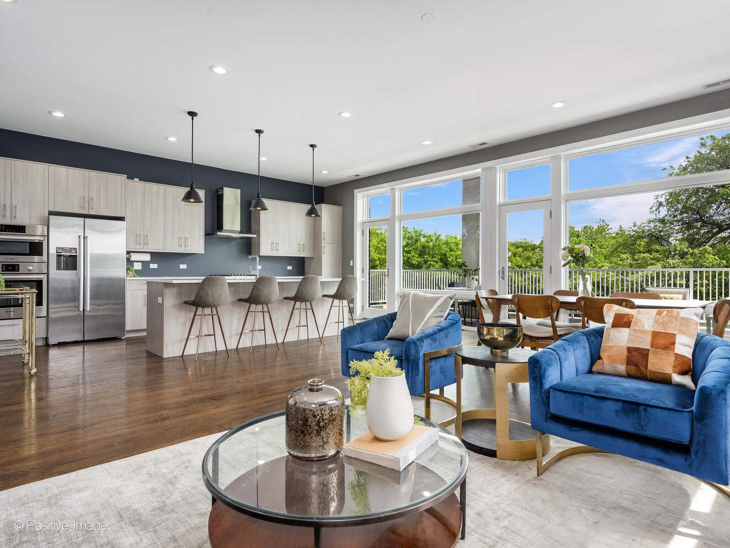 1832 West Rice Street, Unit 3 Chicago, IL 60622 - Photo 5 of 30 a living room with fireplace furniture and a large window