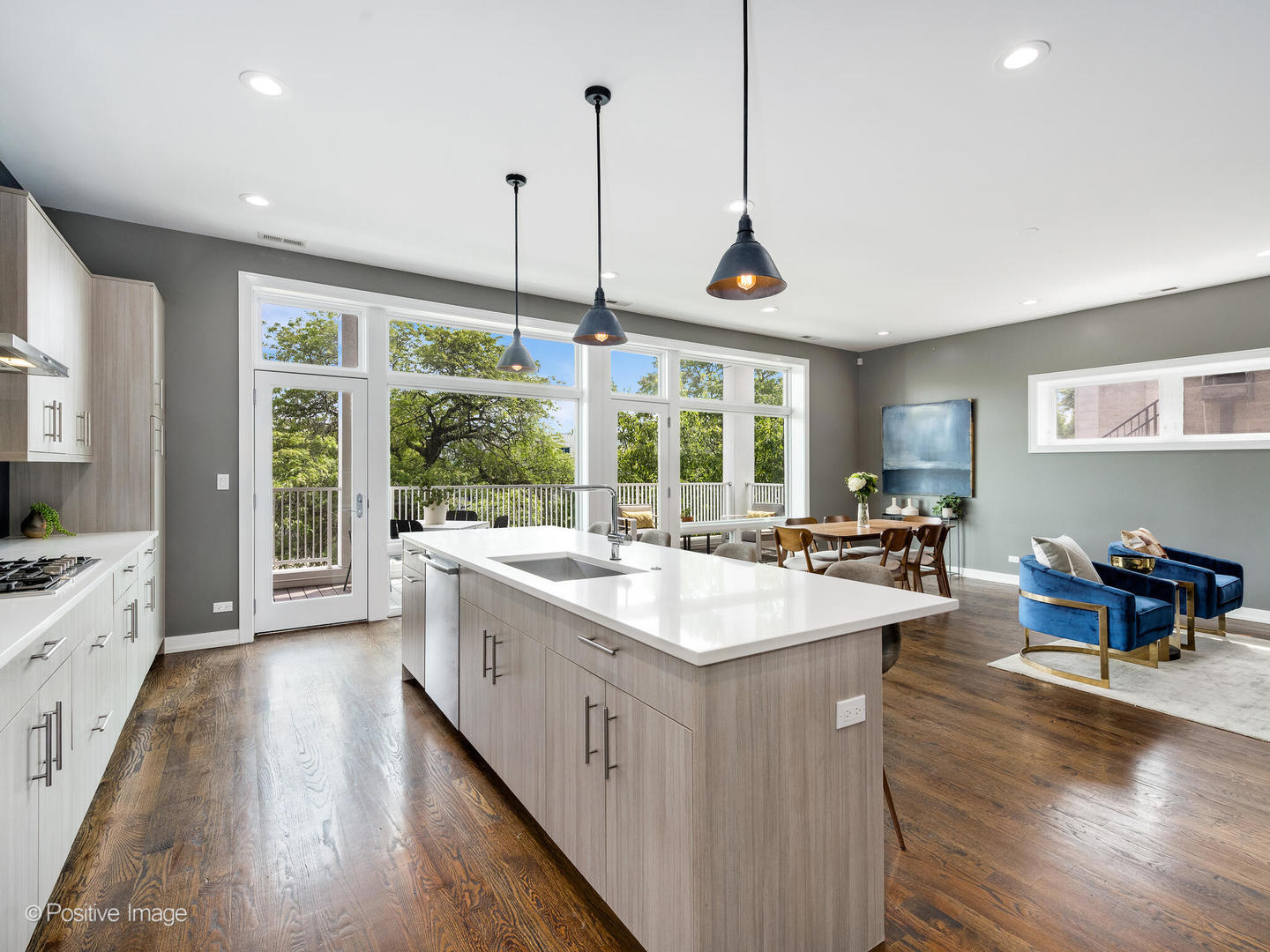 1832 West Rice Street, Unit 3 Chicago, IL 60622 - Photo 10 of 30 a large kitchen with kitchen island a large island in it
