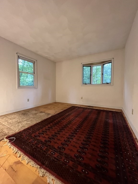 6 New Street Billerica, MA 01821 - Photo 11 of 17 a view of a room with wooden floor and window